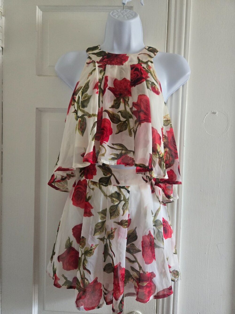 2 piece shorts set with prominent red rose floral print.